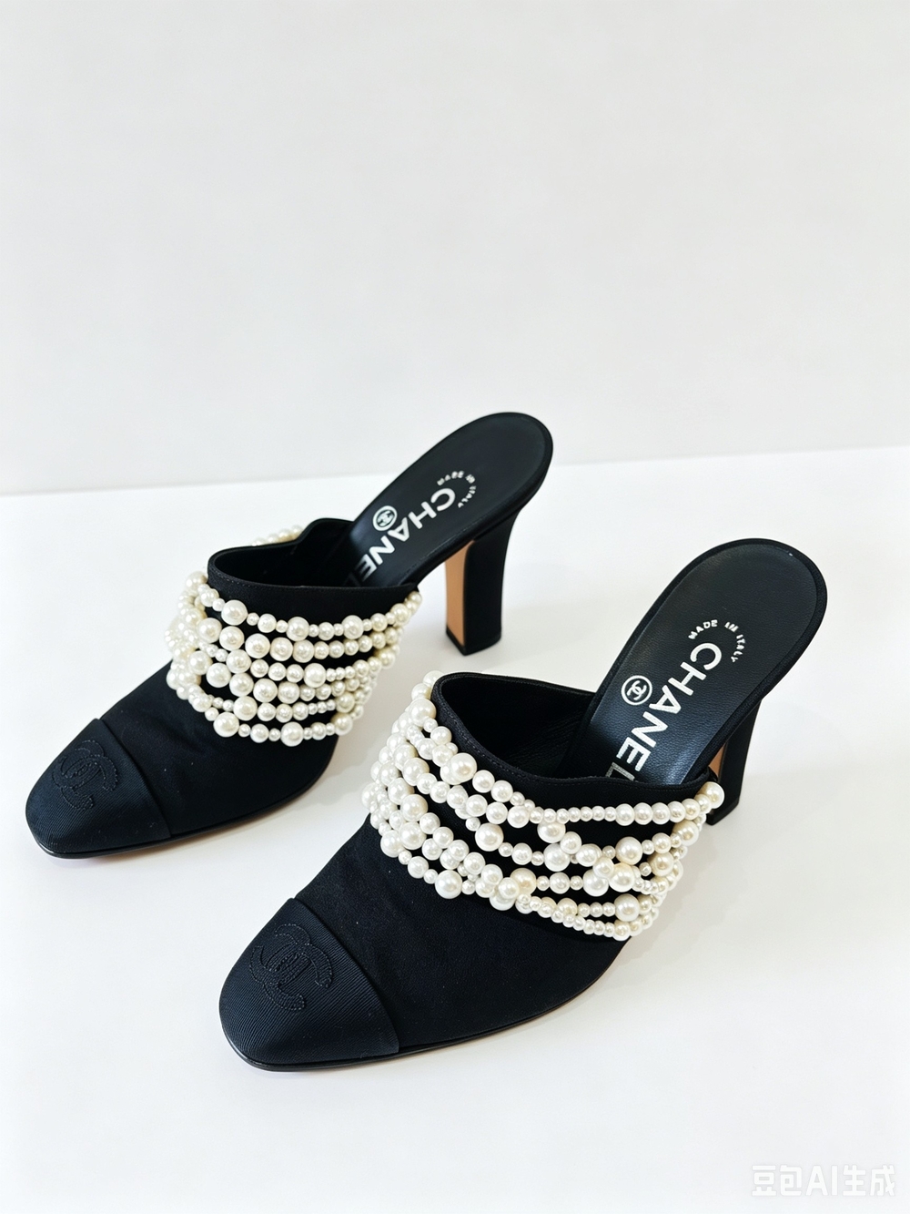 Chanel black pearl  mule heels